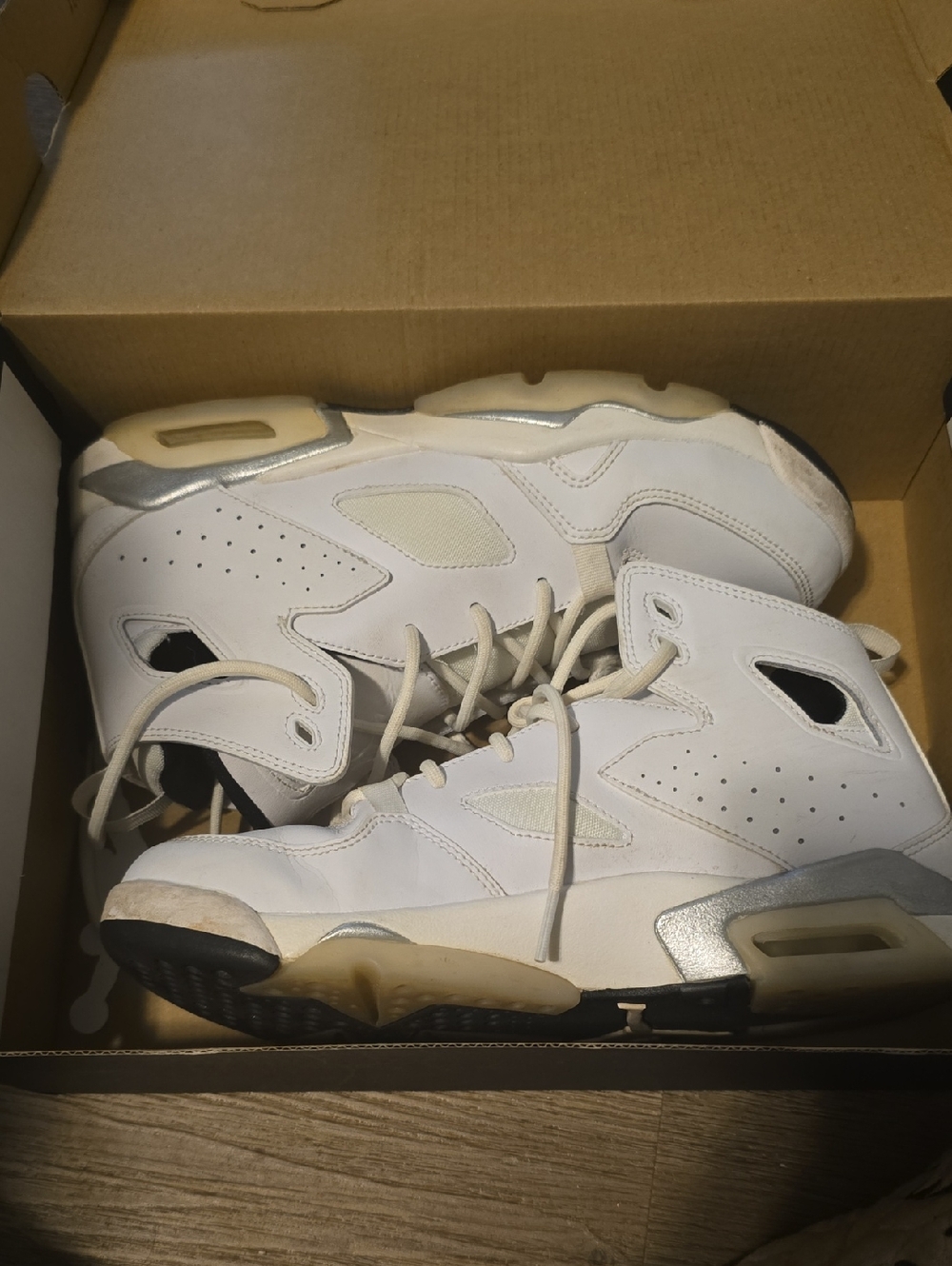 White High-Top Athletic Sneakers with Silver Accents